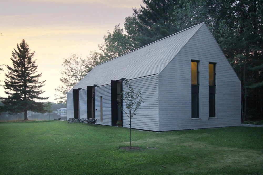 yh2 architecture axxis 19 Una casa de madera con vista a un lago que permite una verdadera comunión con la naturaleza